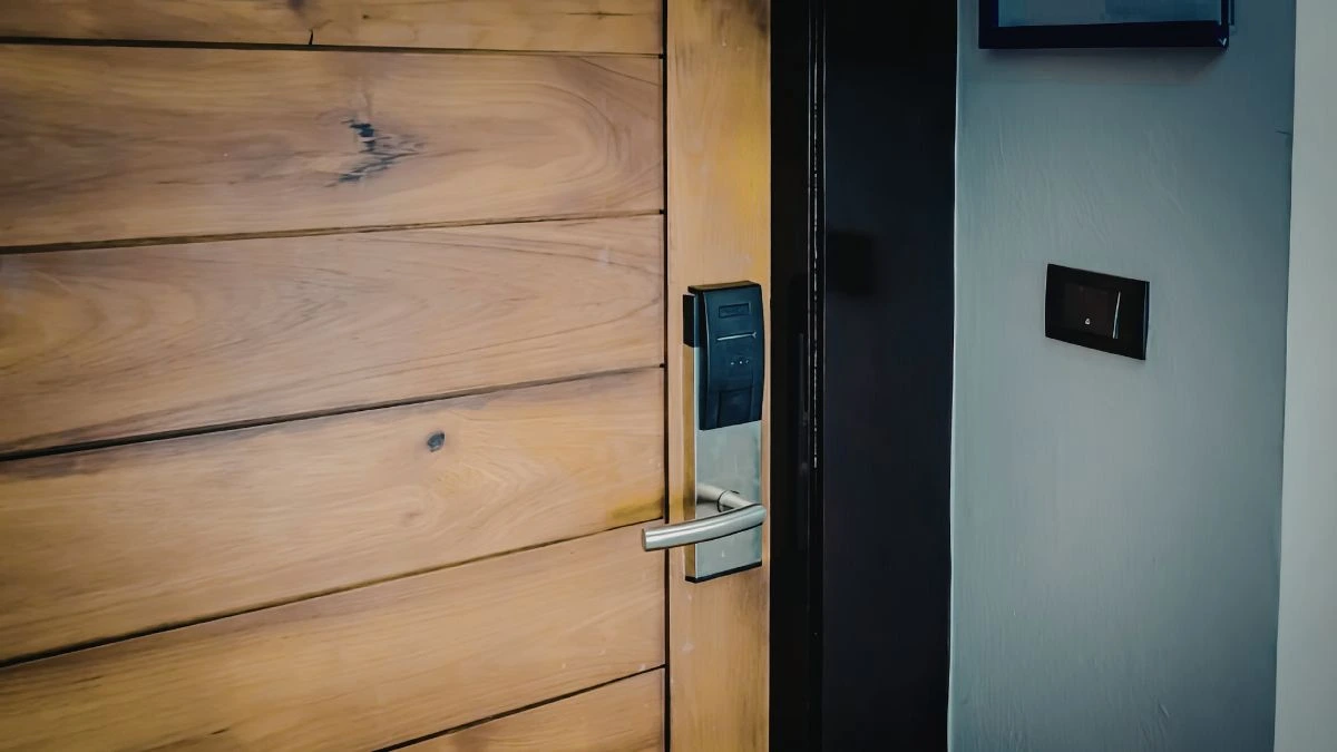 a picture of wood door frame with a smart lock